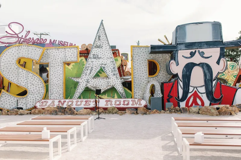 Ceremony benches lined up in front of the giant Stardust letters